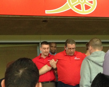 Trainers demonstrating physical intervention to football stewards